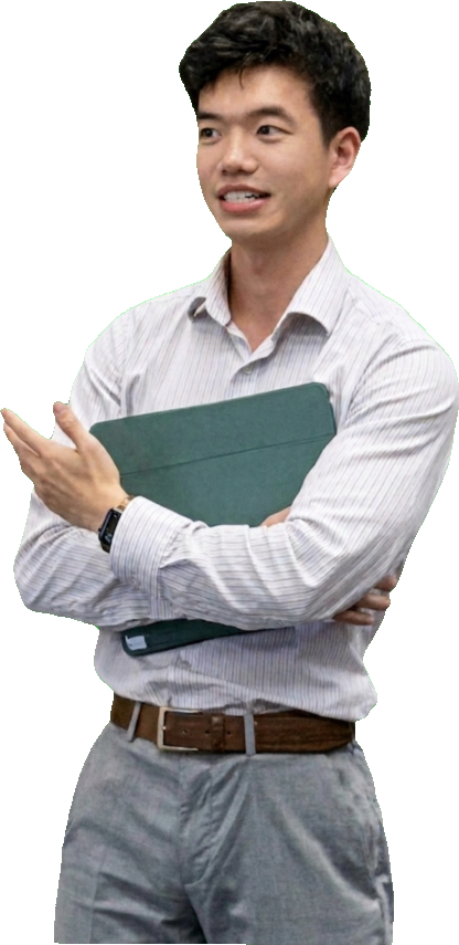Aiden Lin presenting, holding a folder
